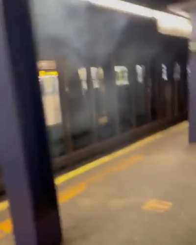 Subway train runs over bike on NYC subway.