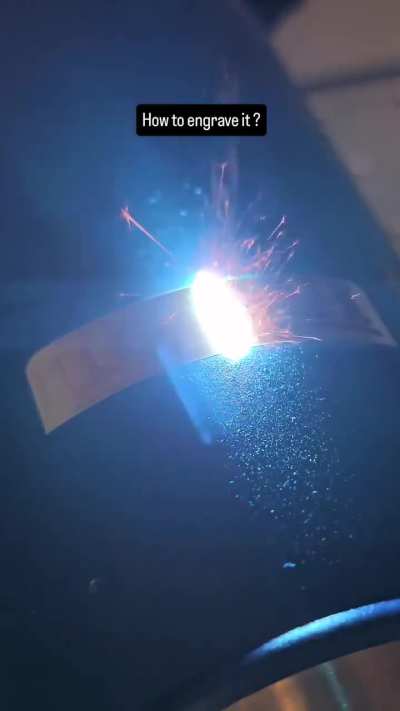 Laser etching over a name