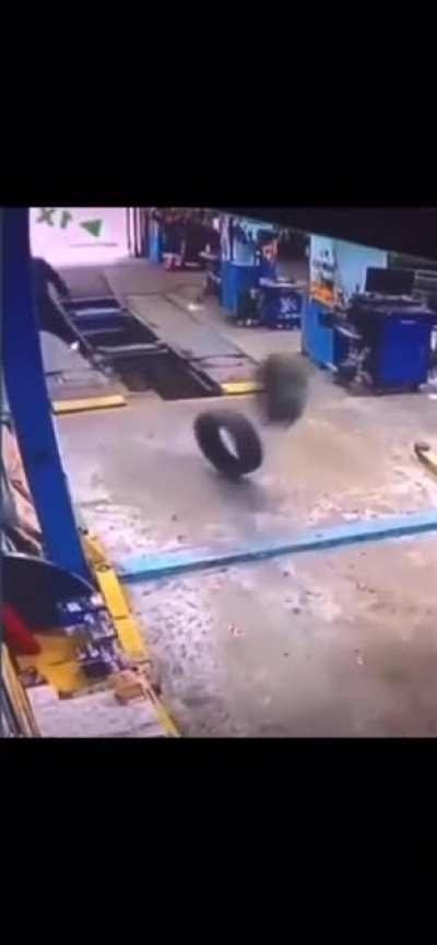 Man stops a tire