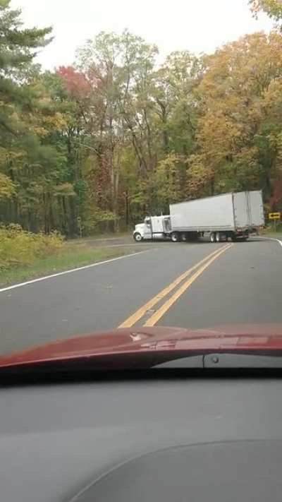 This mountain road has 489 turns and warning signs telling trucks not to use it.