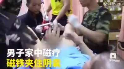 Chinese man rescued after his testicles crushed by powerful magnets while performing "magnet therapy"