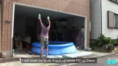 Local Japanese man attempts to become spider man with tape and sticky cockroach traps