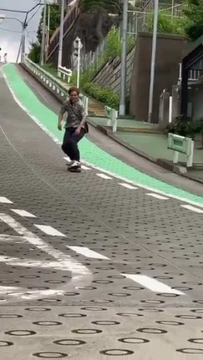 WCGW Riding down a hill with a skateboard