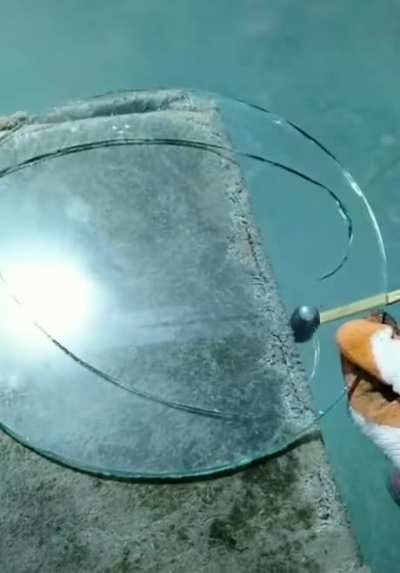 Artistic glass breaking process.