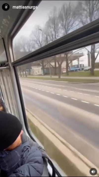 Dude wearing jeans and boots races a train and wins