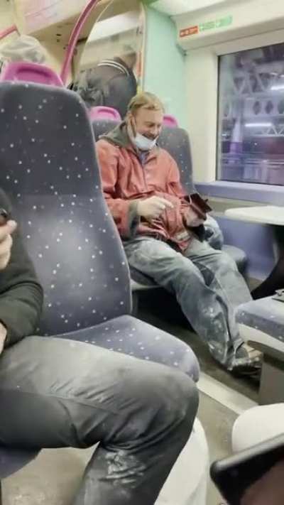 This man forgot to plug in his earphones