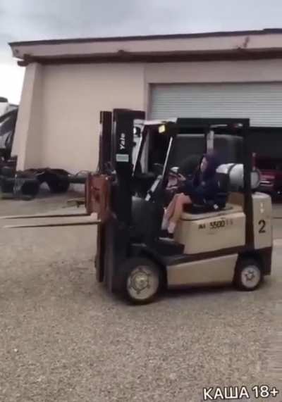 "Uh-oh." Guy lets kid operate a forklift.