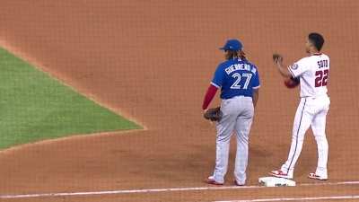 Vladimir Guerrero Jr. having a funny conversation with Juan Soto