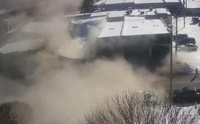 Roof of building in Benton, AR collapses due to weight of snow