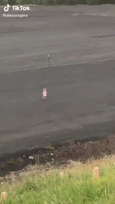 The kid and the sunset in the background