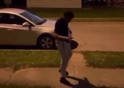 Man does a full front flip from a ground inclined plank position
