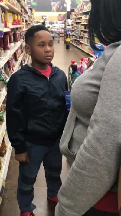 Kid tries to steal a 100 dollar PSN card