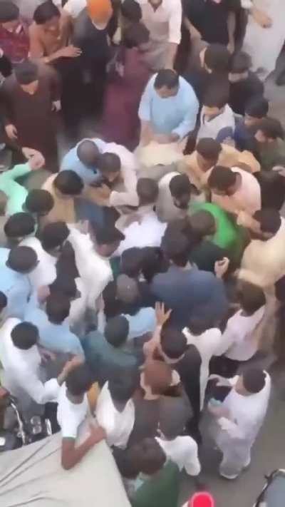 Aerial footage of "Taharrush Gamea" (collective harassment) in which large groups of people crowd together in an attempt to sexually harass women in public