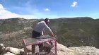 Rescued condor spreading its wings to familiarize itself with the wind currents before taking off