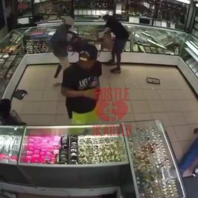 A deaf man walks into a jewelry store.