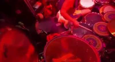 Tool drummer Danny Carey hits gong with dildo (in concert)