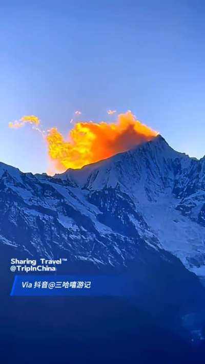 ? Illusion of flames burning on the top of the mountain.