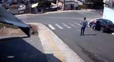 Guy jumps into a out of control to stop it from crashing