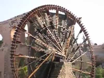 The "Norias of Hama" is a medieval waterwheel machine built in 1361 in Hama, Syria. It fed water into an irrigation aqueduct for centuries until it was made obsolete by electric pumps in the early 20th century.