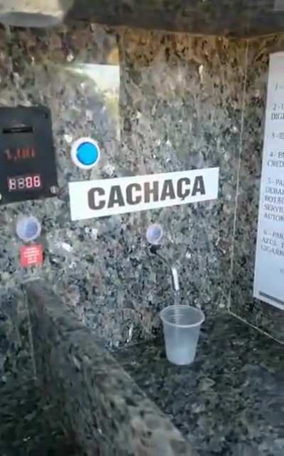 The owner of this bar created a dispenser to sell "cachaça" (distilled drink very common in Brazil) and cigarettes automatically even when the bar is closed.