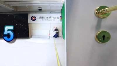 Lars Andersen, perhaps the greatest archer of the 21st century, shoots 7 arrows through a keyhole.