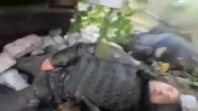 Russian MT-LB was ambushed by Ukrainian soldiers and crashed into a house. The leg of a Russian soldier is stuck under a collapsed wall. When a Ukrainian fighter tries to help, the Russian asks to finish him off, to which he receives an answer: "We are no