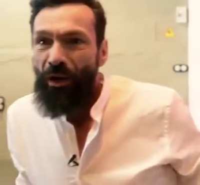 Homeless man can't believe his transformation after barbers cut his hair.