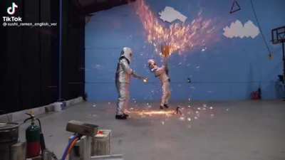 Slamming molten iron with a shovel!