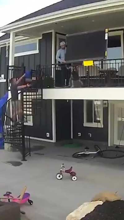 WCGW Trying to go down backwards a spiral staircase with a 60" screen TV