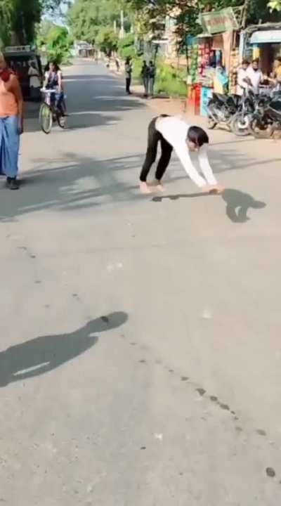 Back flipping in the middle of the road