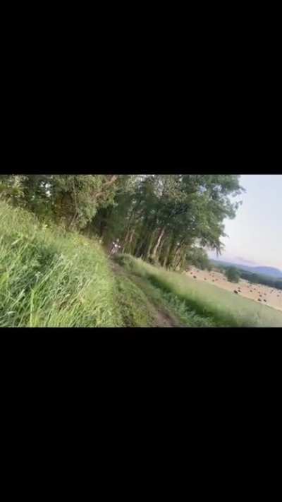 Quad bike drifting on farm