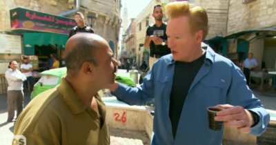 CONAN WITH SAMI THE COFFEE GUY IN BETHLEHEM PALESTINE