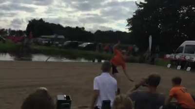 Fierljeppen World record holder Jaco de Groot at 22.21m - (Dutch canal jumping / ditch-vaulting)