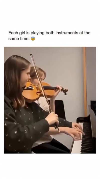 Both girls are playing both instruments at the same time ?