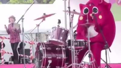 This guy's subtle drumming at a children's concert