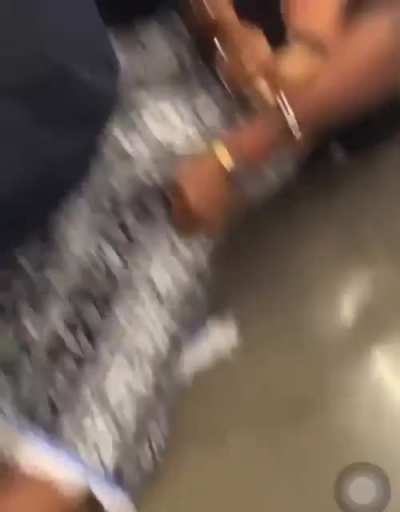 Cop decks crazy woman for trying to bite him!