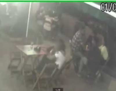 WCGW if A man hits a woman at the bar and takes change from 4 men who were at the next table.