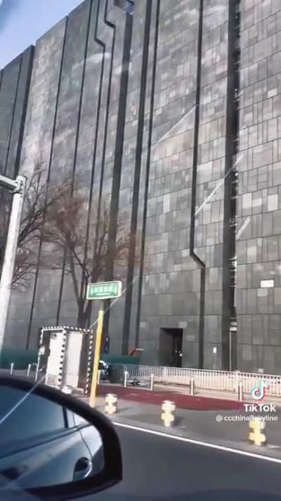 a very brutalist data center building in beijing
