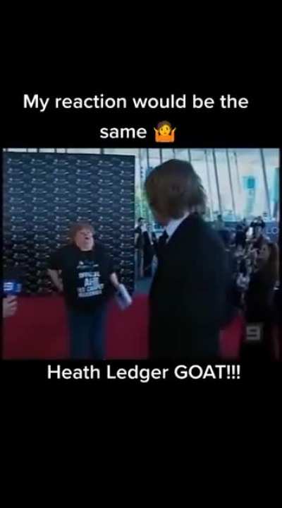 Heath Ledger greets a fan