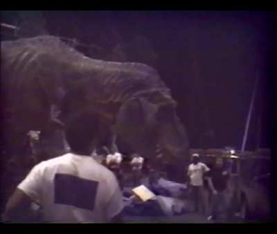 Behind the scenes of "Jurassic Park", as the special effects team tests the animatronics for the full-size T-REX (the largest animatronic ever created by Stan Winston Studios)