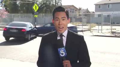 TV news crew is doing a story about a dangerous intersection and an accident happens in perfect view