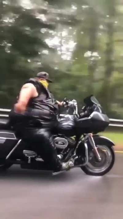 This absolute unit on a Harley bike