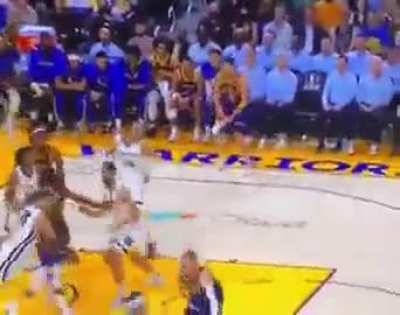 An impressive simultaneous basketball and shoe pass during an NBA game