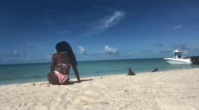 Trying to do some yoga on a beach