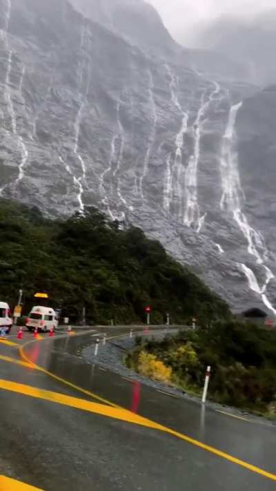 ? A place in New Zealand where many waterfalls follow the slopes of a mountain - ? by @rajdeep_jimmy on insta