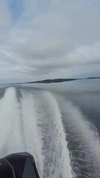 Jetski on a reflective lake