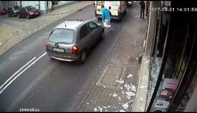 Guy vandalized window and then got hit by a car