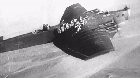 Early trials of mass paratrooper drops included transporting them on top of the planes then sliding off the wings.