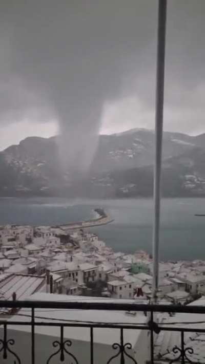 ? Waterspout on the port of Skopelos Island, Greece - Monday, January 24, 2022