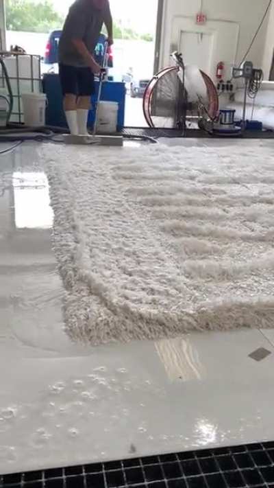 Cleaning a white rug